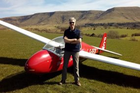 Cdr Barney Wainwright and K13 in a Field